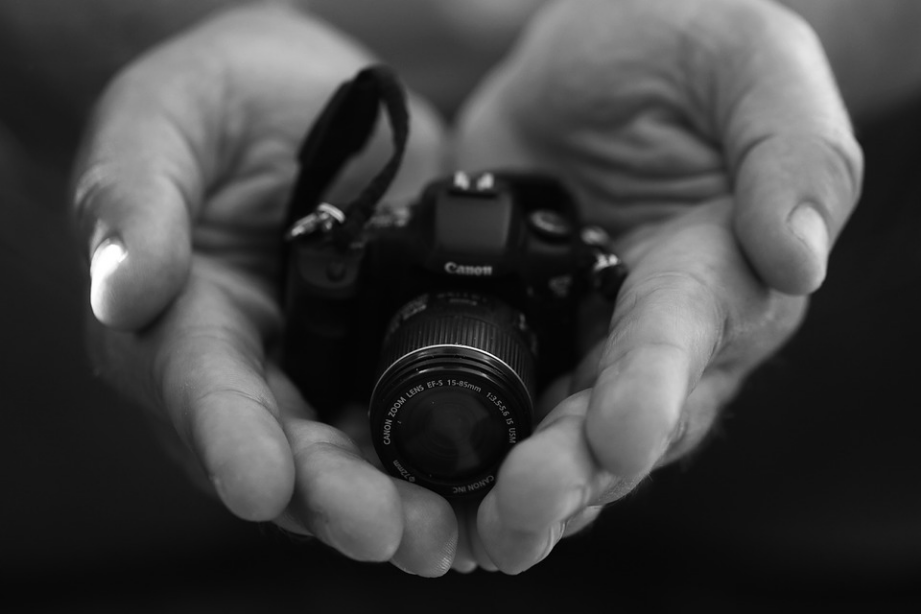 a black and white shot of a camera